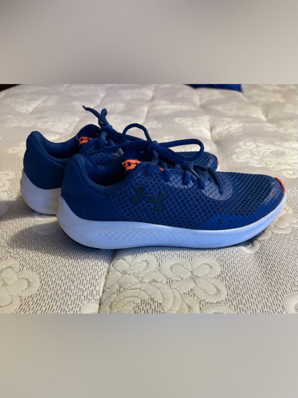 Kids Under Armour Blue Mesh Sneakers with White Sole and Orange Accents